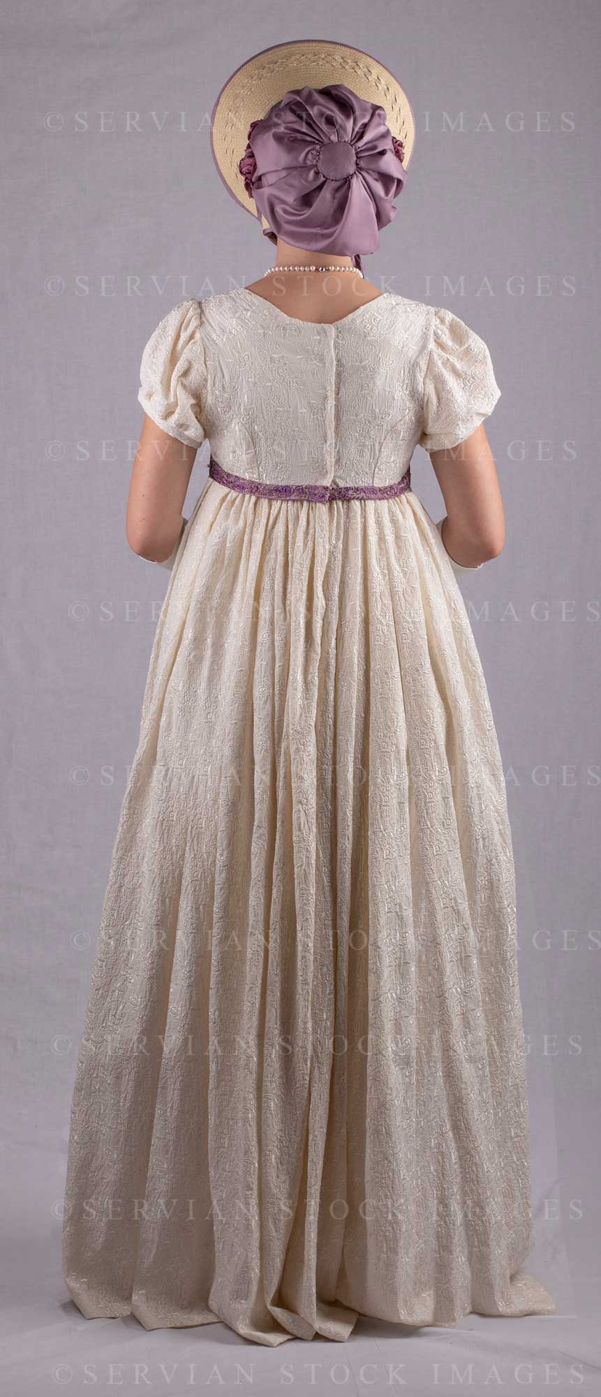 Regency woman in a cream embroidered dress and long gloves (Skye 0039)