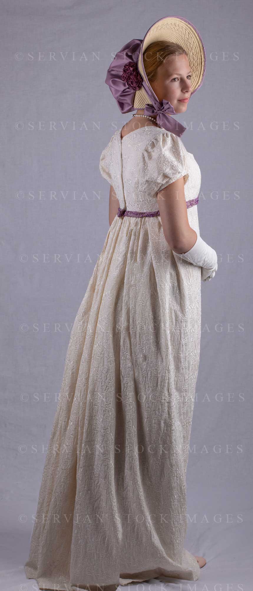 Regency woman in a cream embroidered dress and long gloves (Skye 0047)