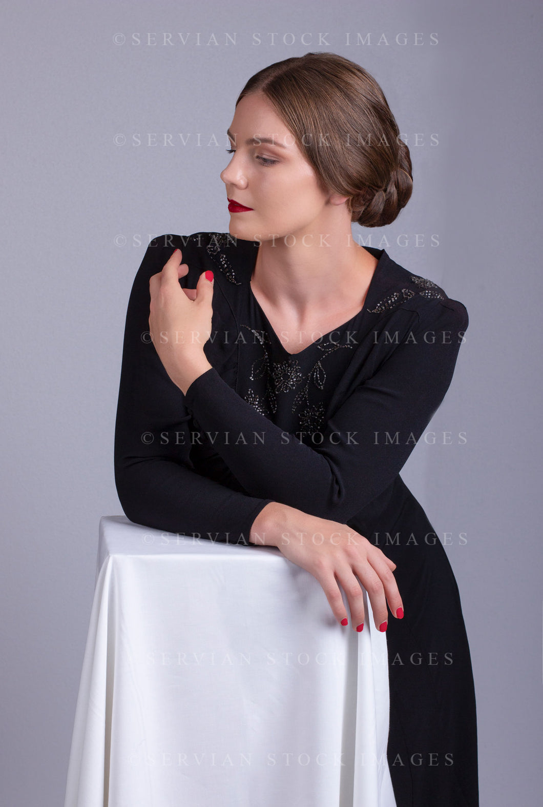1930s woman in a vintage black, beaded dress (Tayla 0089)