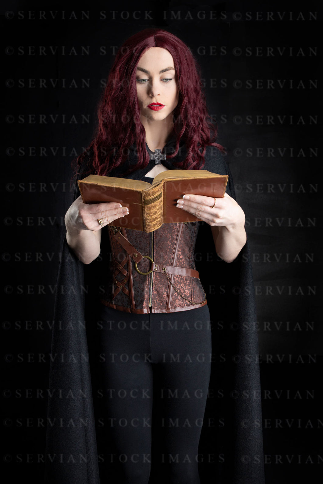High Fantasy or magical woman wearing a cloak and holding a  book (Lacey 2037)