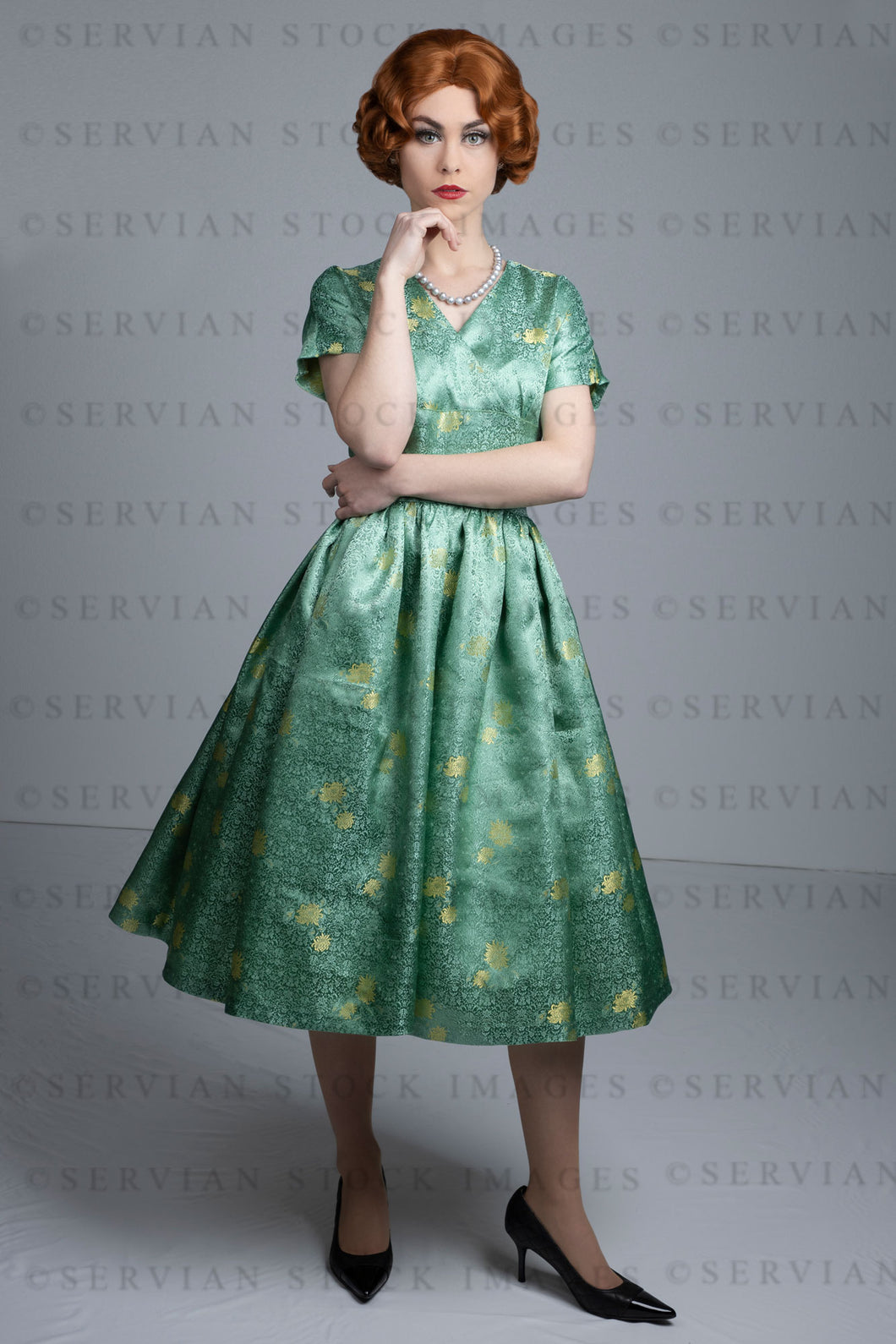 1950s woman in green brocade vintage dress (Lacey 2424)