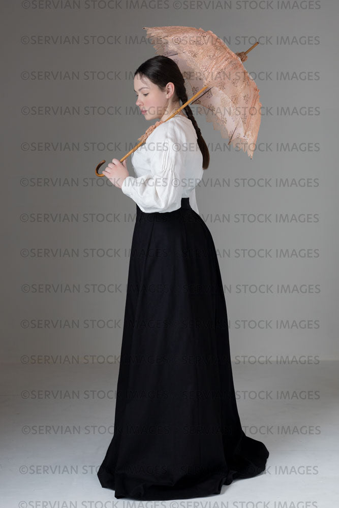 Young Victorian / Edwardian woman wearing a white linen blouse and black skirt (Kate 580)