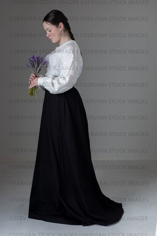 Young Victorian Edwardian woman wearing a white linen blouse and black skirt Kate 588