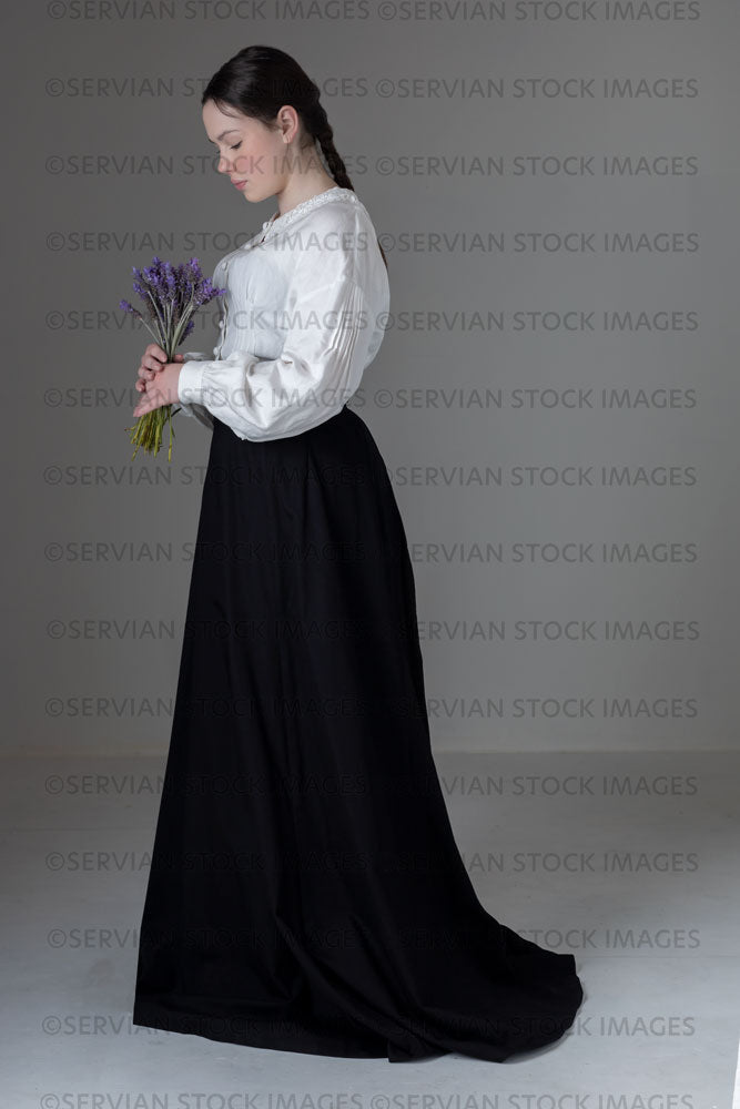 Young Victorian / Edwardian woman wearing a white linen blouse and black skirt (Kate 588)