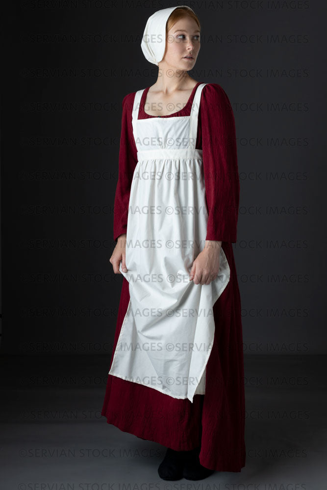 Regency maid or working class woman wearing a red dress, apron, and cap  (Lauren 0622)
