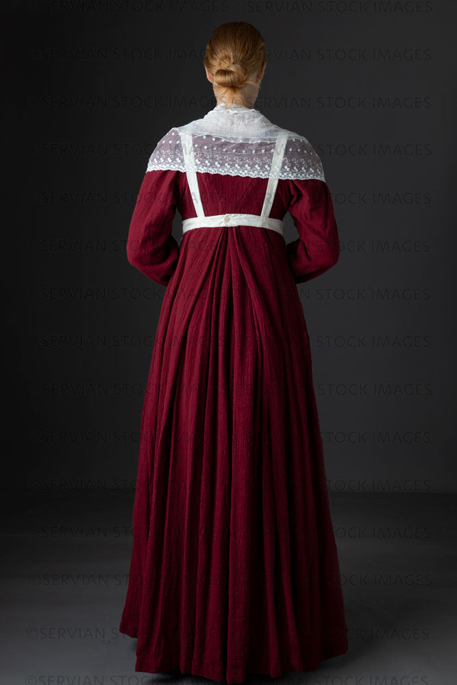 Regency maid or working class woman wearing a red dress, apron, and la –  Servian Stock Images