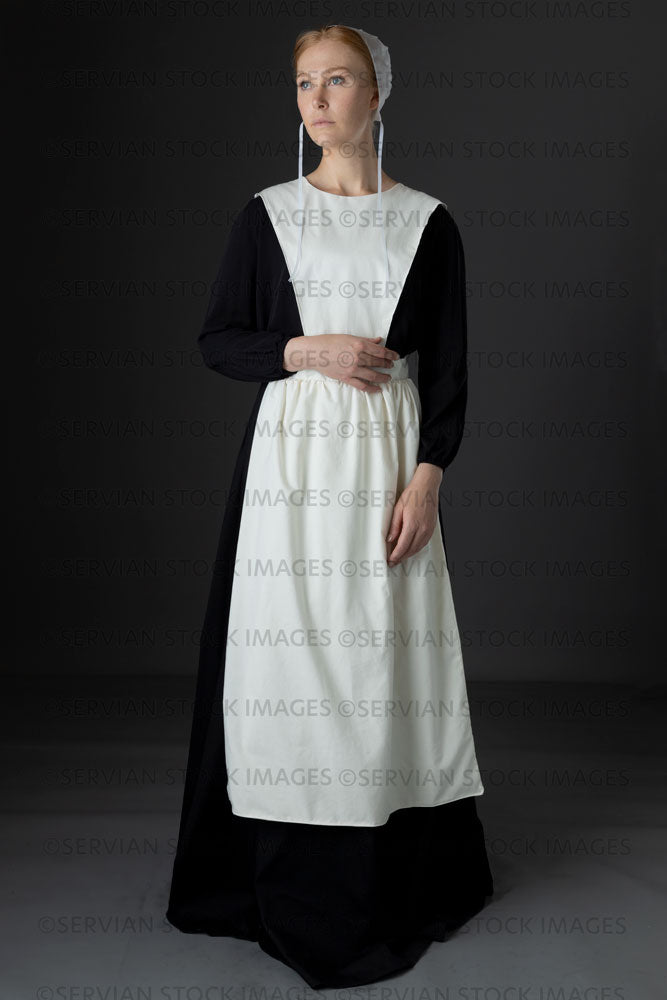 amish white dress woman wearing a black with a apron and cap (Lauren 0783) You will have it in time to be the hit of the party Amish Dress Set