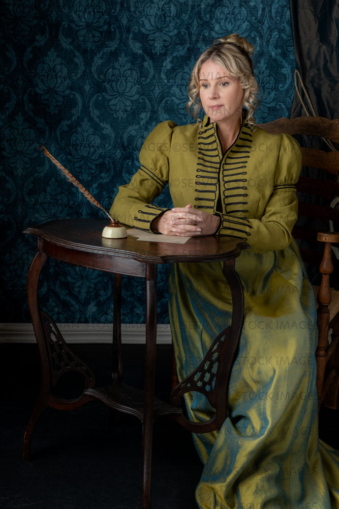 Regency woman wearing a green shot silk dress and green linen spencer –  Servian Stock Images
