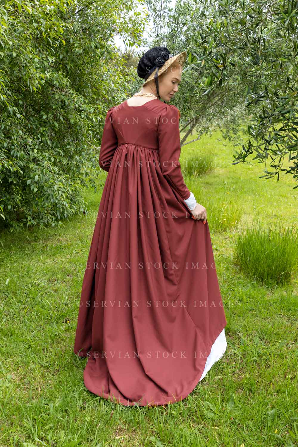 Regency woman in white muslin dress with a long spencer (Lauren 4581)