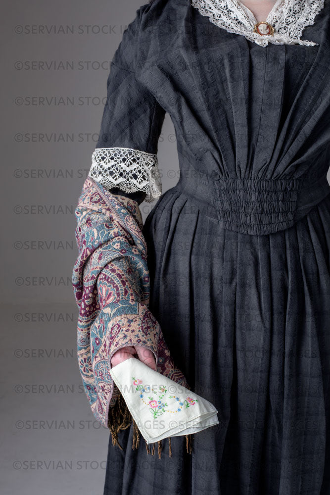 Young Victorian woman wearing a grey/blue cotton dress with antique lace trim (Kate 9658)