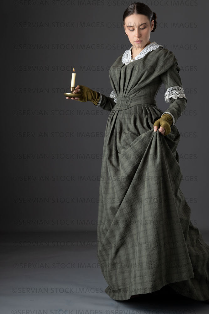 Victorian working class woman in dark green bodice and skirt (Sarah 12 –  Servian Stock Images