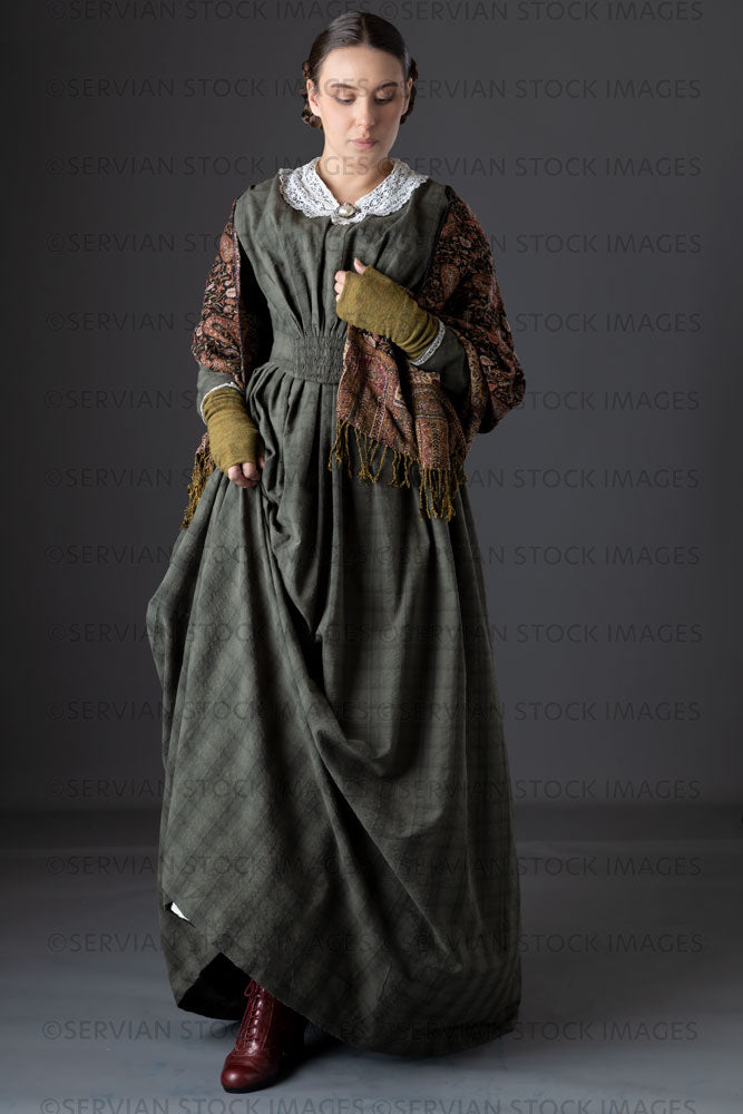 Victorian working class woman in dark green bodice and skirt (Sarah 12   Servian Stock Images
