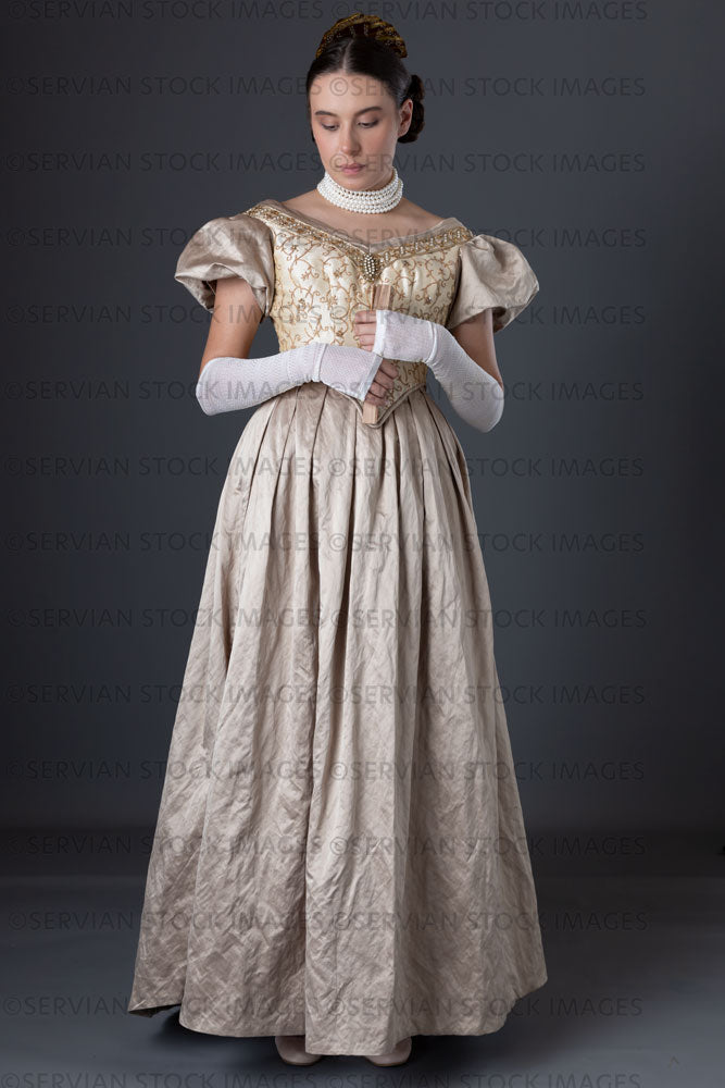 Victorian woman wearing a gold ball gown  (Sarah 1293)