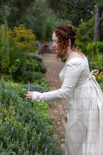 Regency woman wearing a day dress and walking in a garden (Agnes 6911)