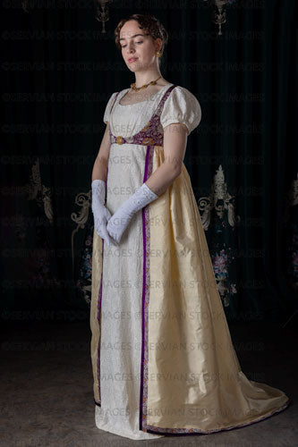 Regency woman wearing an embroidered dress and long spencer (Viola 7033)