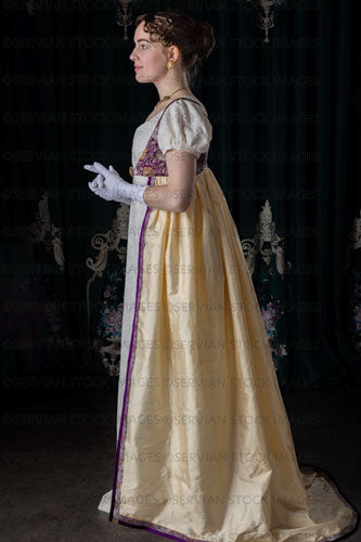 Regency woman wearing an embroidered dress and long spencer (Viola 7038)