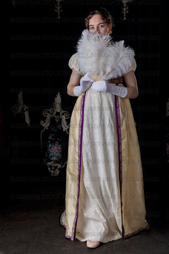 Regency woman wearing evening dress and holding a feather fan (Viola 7054)