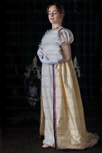Regency woman wearing evening dress and holding a feather fan (Viola 7064)