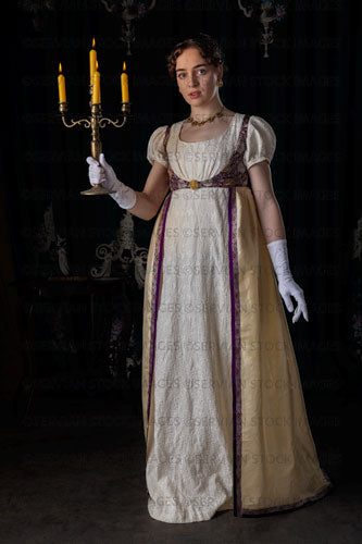 Regency woman wearing evening dress and holding candles (Viola 7104)