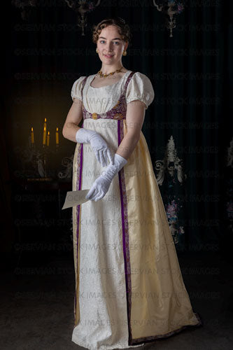 Regency woman wearing evening dress and holding a letter (Viola 7116)
