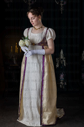 Regency woman wearing an evening dress and holding roses (Viola 7121)