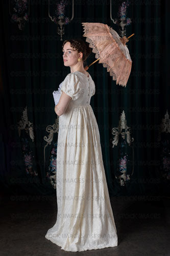 Regency woman wearing a day dress with a parasol (Viola 7220)