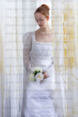 Regency woman wearing a cotton dress and surrounded by lace curtains (Liv 7942)