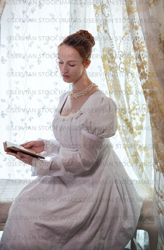 Regency woman wearing a cotton dress and surrounded by lace curtains (Liv 7968)
