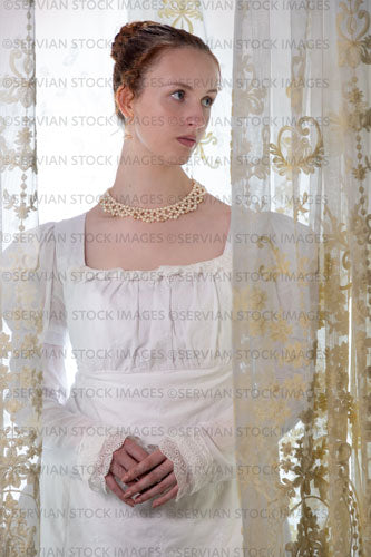 Regency woman wearing a cotton dress and surrounded by lace curtains (Liv 7995)