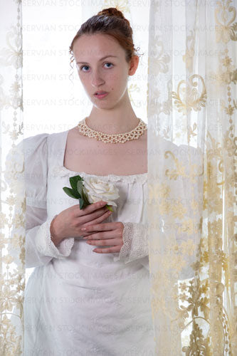 Regency woman wearing a cotton dress and surrounded by lace curtains (Liv 7999)