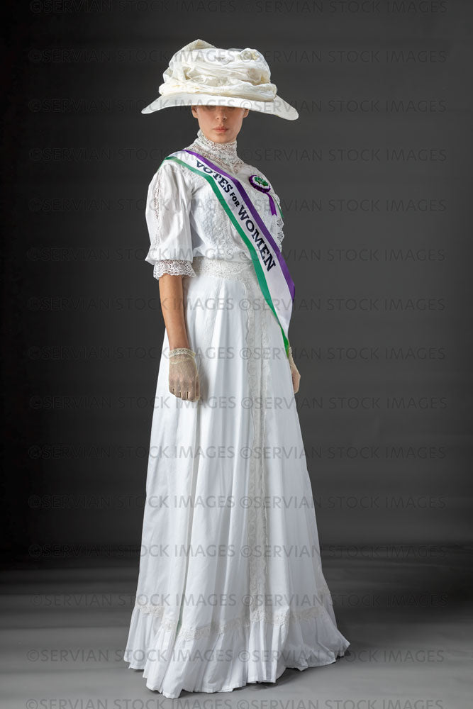 United Kingdom Suffragette from late 19th / early 20th century wearing a white lace blouse and skirt (SARAH 407UK)