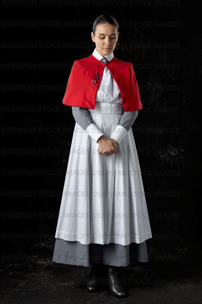 World War 1 nurse in grey uniform dress with a white apron and red cape (Sarah588)