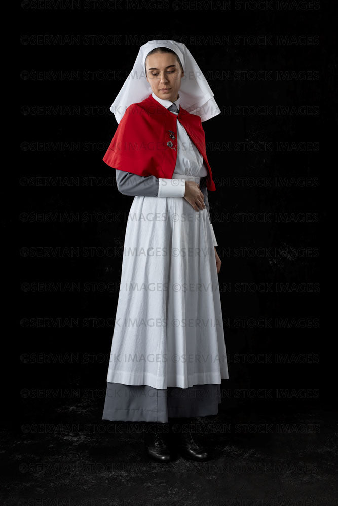 World War 1 nurse in grey uniform dress with a white apron and red cape (Sarah632)