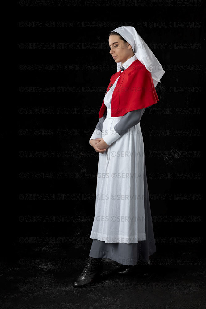 World War 1 nurse in grey uniform dress with a white apron and red cape (Sarah641)