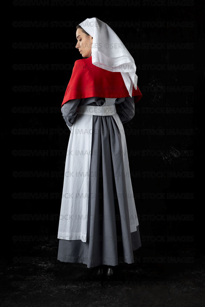 World War 1 nurse in grey uniform dress with a white apron and red cape (Sarah649)