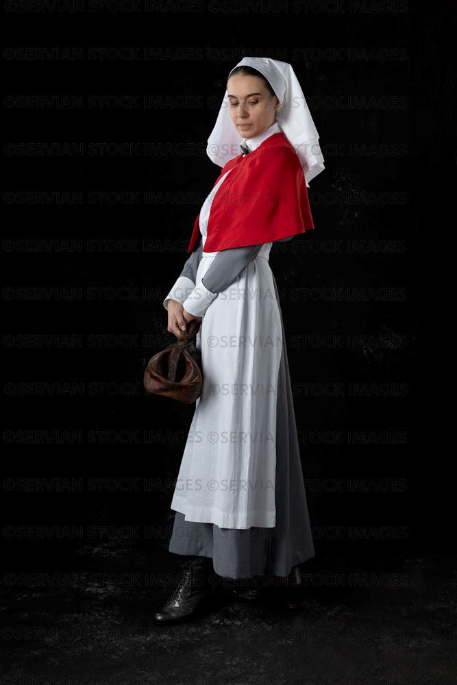 World War 1 nurse in grey uniform dress with a white apron and red cape (Sarah662)