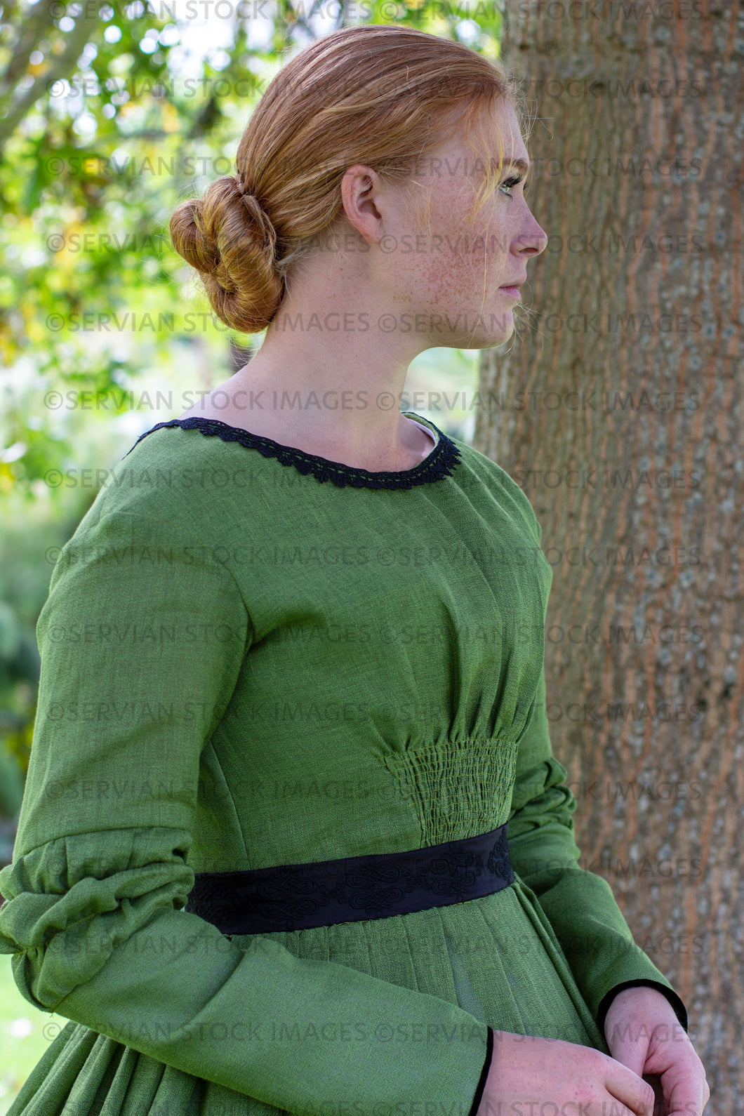 Victorian woman in a green gather front bodice and skirt  (Lauren 0102)