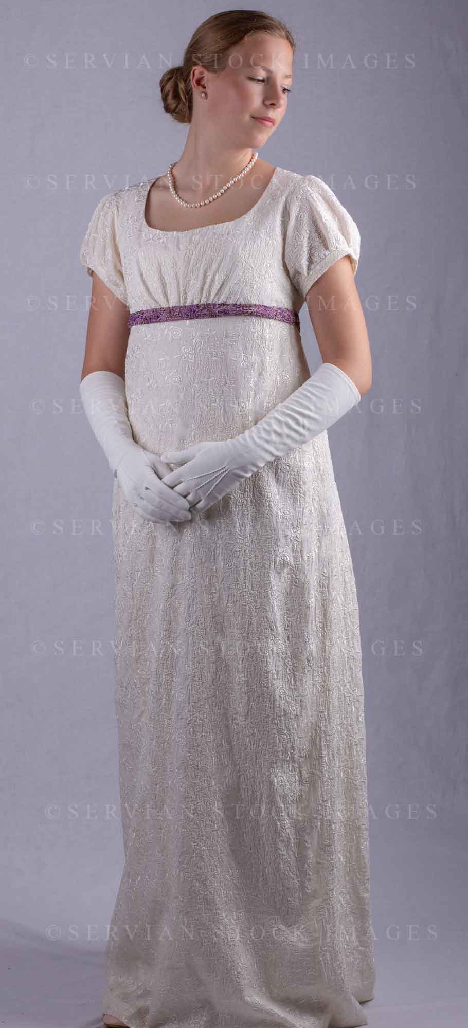 Regency woman in a cream embroidered dress and long gloves (Skye 0030)