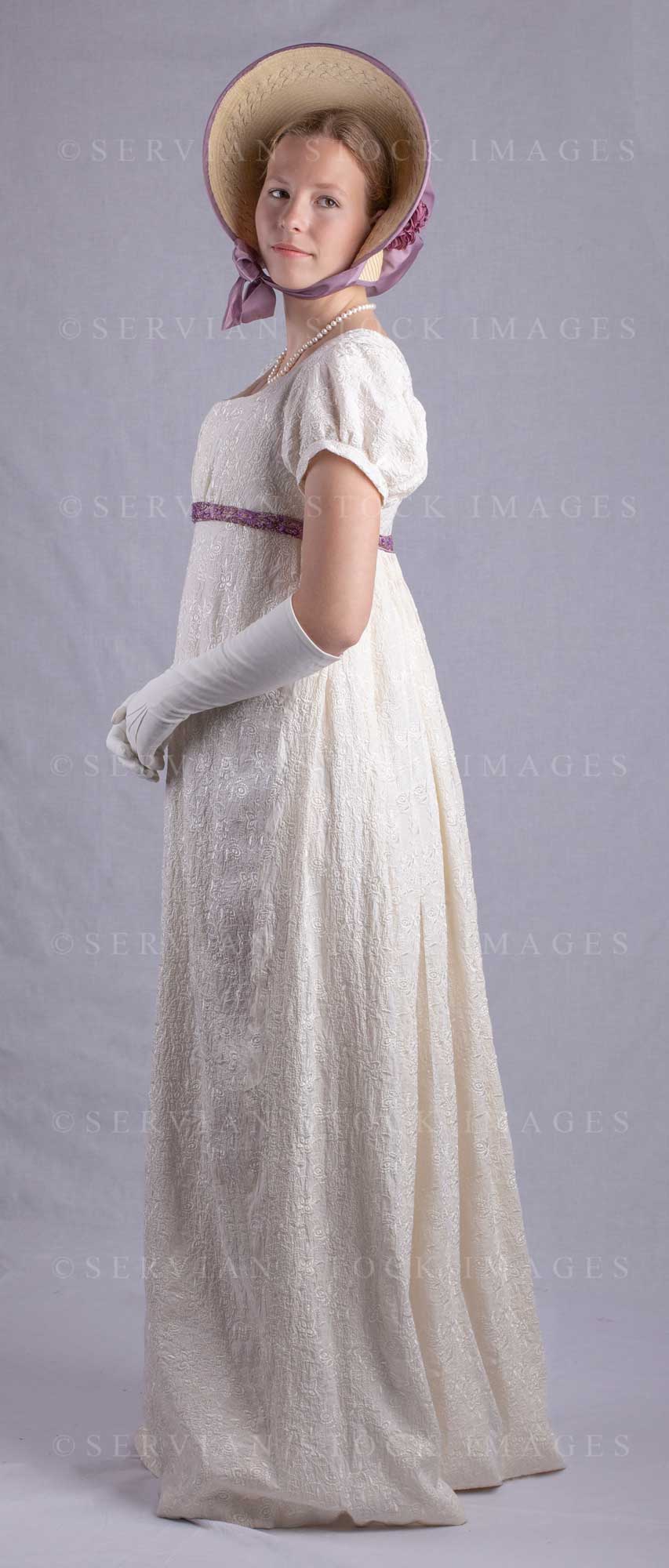 Regency woman in a cream embroidered dress and long gloves (Skye 0035)
