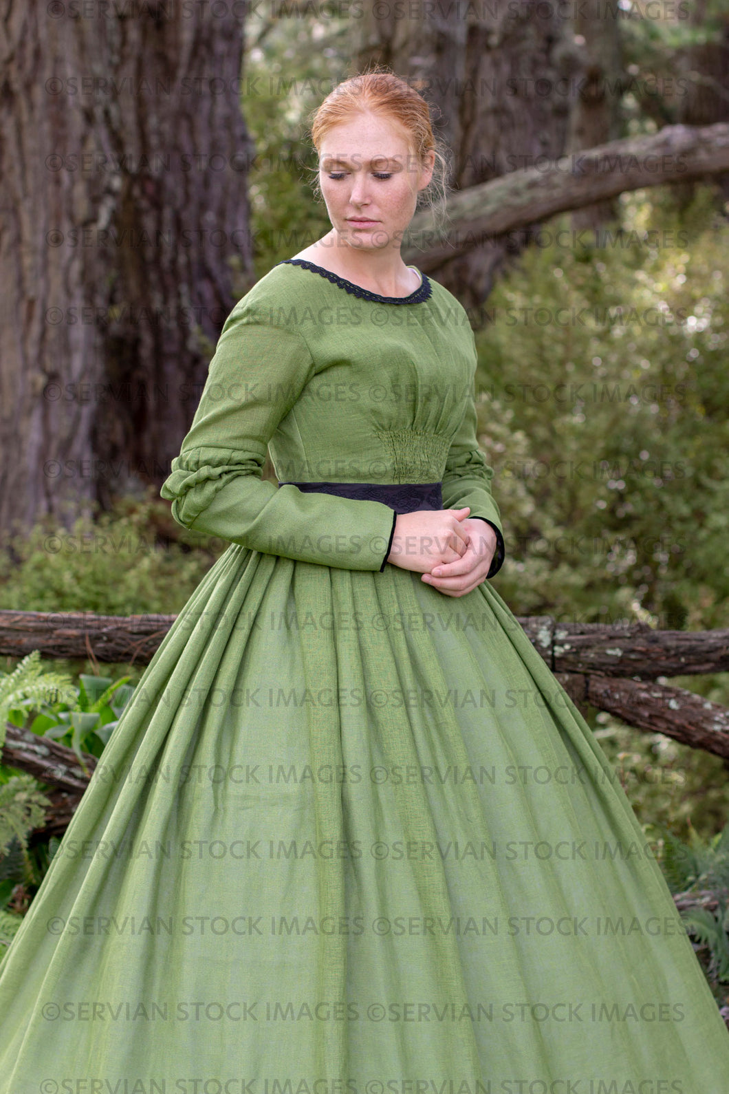 Victorian woman in a green gather front bodice and skirt  (Lauren 0049)