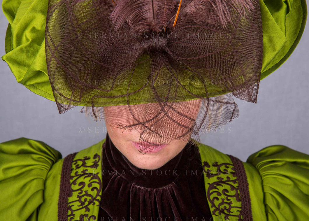 Victorian woman in a green silk ensemble (Lauren 0064)