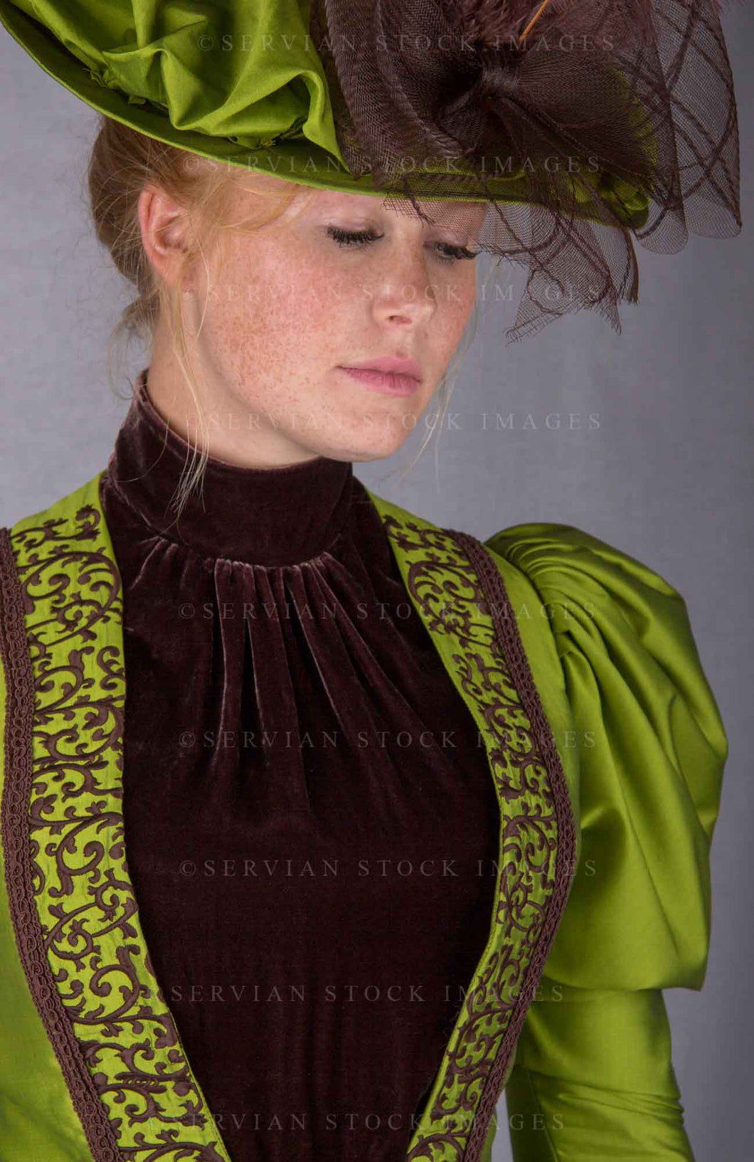 Victorian woman in a green silk ensemble (Lauren 0071)