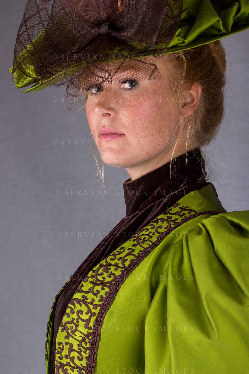 Victorian woman in a green silk ensemble (Lauren 0085)