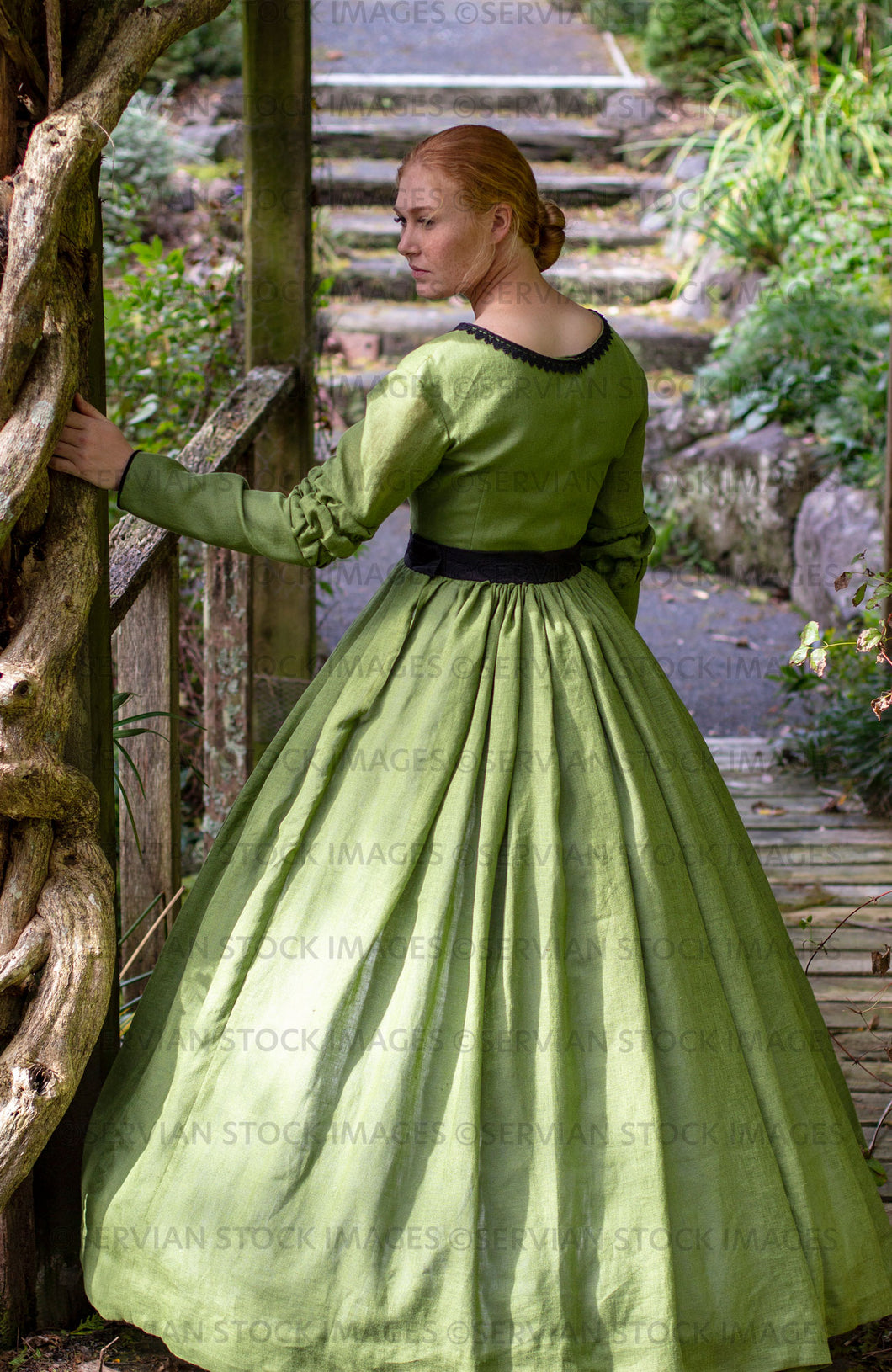 Victorian woman in a green gather front bodice and skirt  (Lauren 0086)