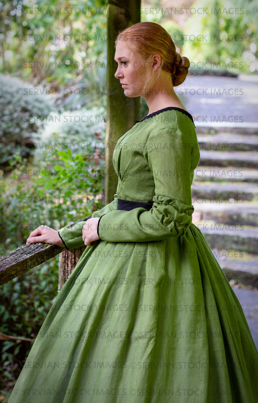 Victorian woman in a green gather front bodice and skirt  (Lauren 0092)