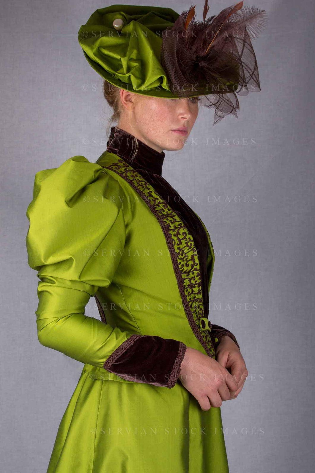 Victorian woman in a green silk ensemble (Lauren 0102)