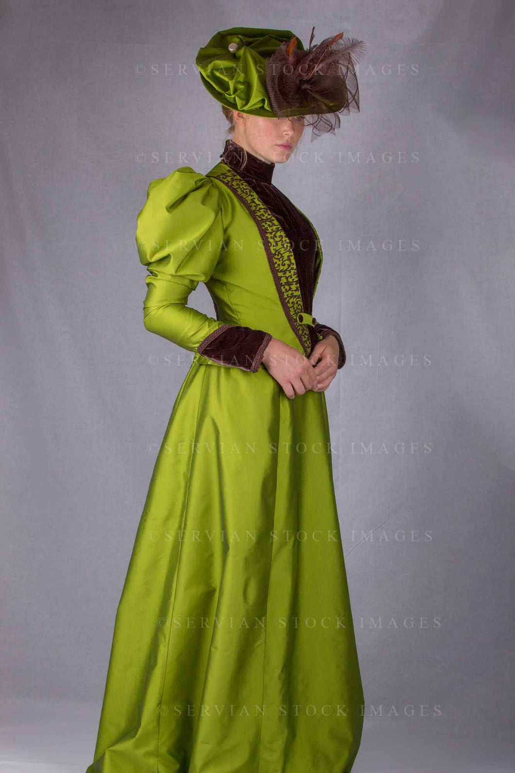 Victorian woman in a green silk ensemble (Lauren 0104)