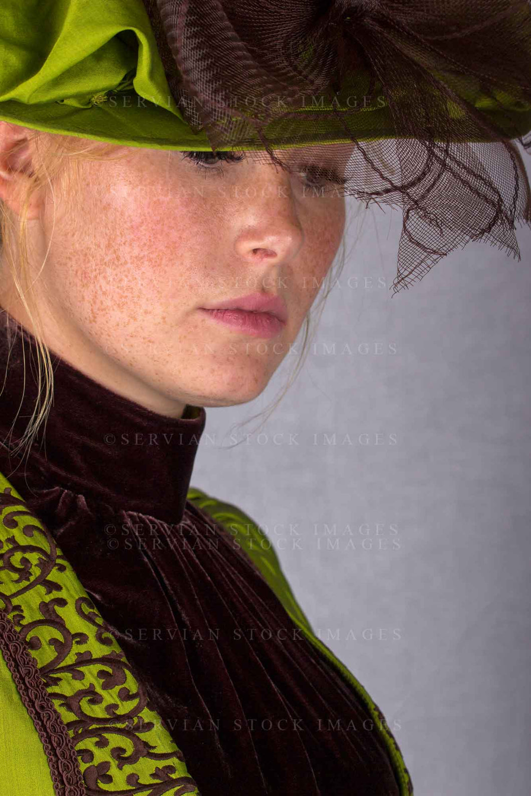 Victorian woman in a green silk ensemble (Lauren 0106)