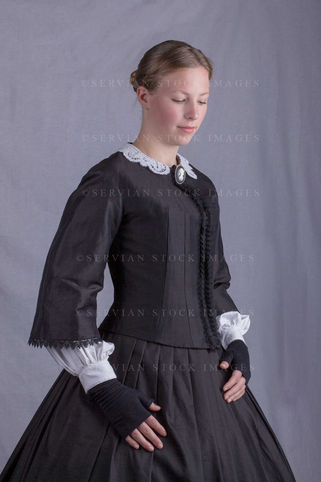 Victorian woman wearing a black bodice and skirt (Skye 0121)