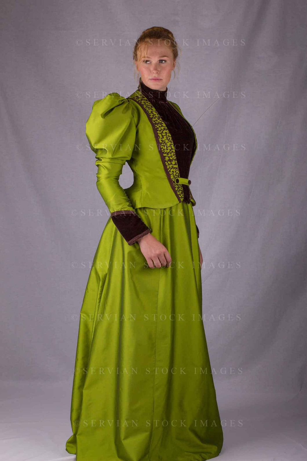 Victorian woman in a green silk ensemble (Lauren 0128)